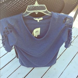 NWT women’s retrelogy top size m